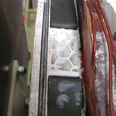 Magnets backed with iron wire Turn iron wire until the disk is full. Diameter of the wire is not important